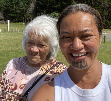 Image of two ladies taking a picture together